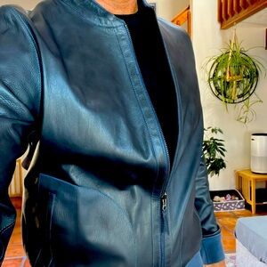 Highest quality, never worn reversible blue leather/suede jacket. Med/40 men’s